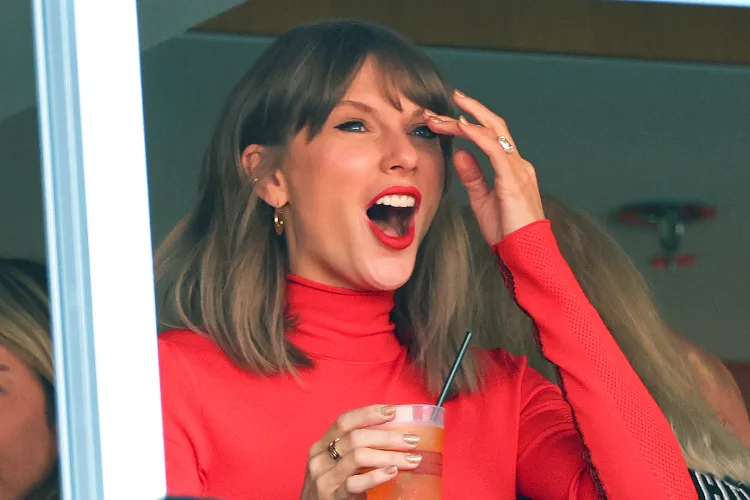 Taylor Swift Cheers on Travis Kelce at Chiefs Game With Caitlin Clark